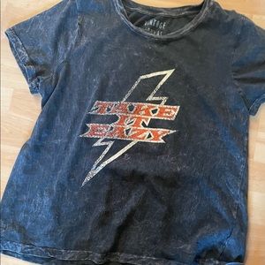 Super cute vintage looking t shirt. Great quality, just don’t wear it.